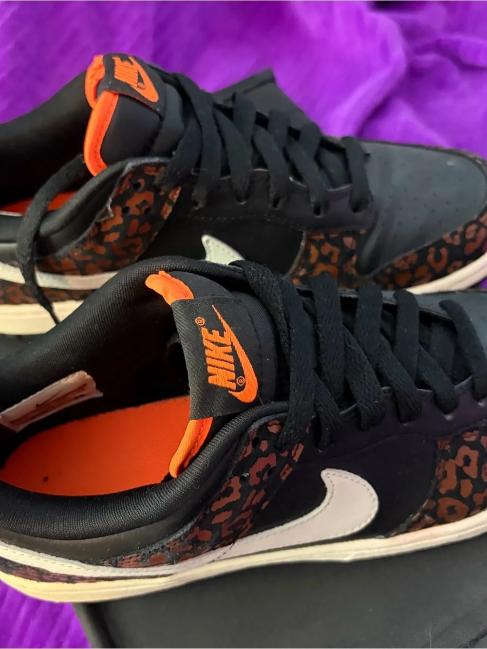 Nike Women’s Low-Top Sneakers in Black with Brown Leopard Accents
